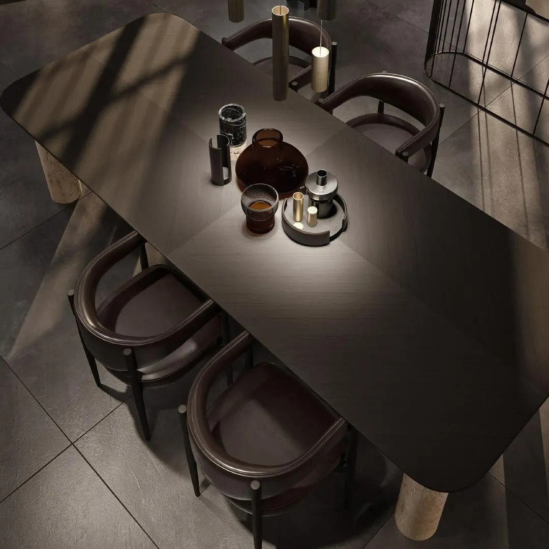 Top view of a bespoke luxury dining table and designer chairs by Qasr Al-Ajwaad, high-end villa furniture in Muscat, Oman.