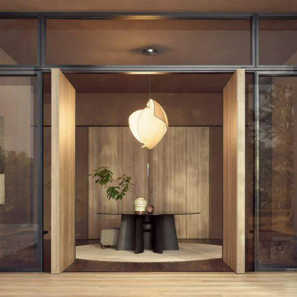 تصميم مدخل مودرن فاخر مع طاولة طعام وإضاءة فنية من قصر الأجواد، أرقى تصاميم الأثاث والديكور الإيطالي للفلل في مسقط، عمان.