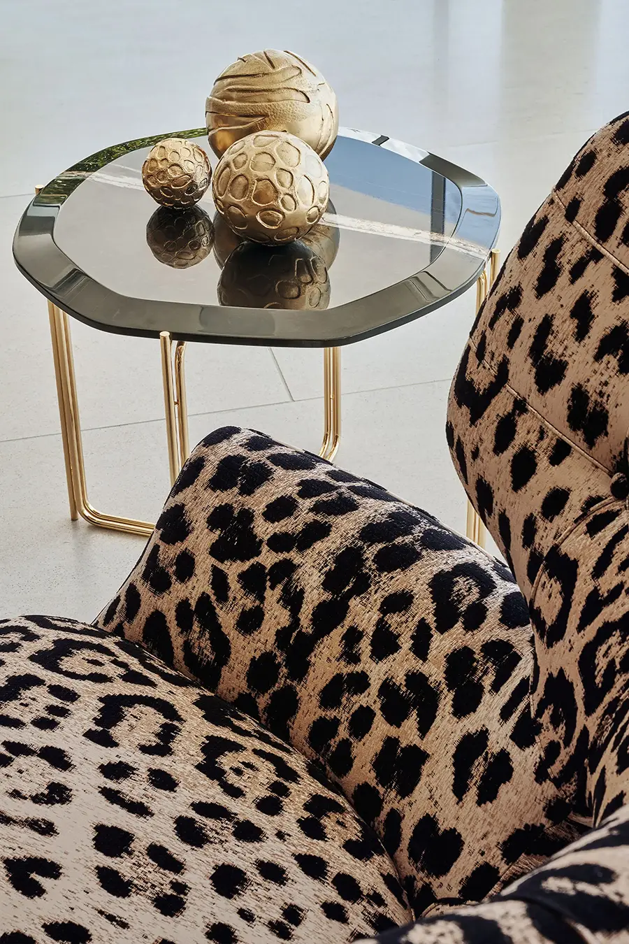 14416-RCHI_2023_WHITE-WILD_roberto-cavalli-leopard-print-accent-chair-details-ajwaad-palace