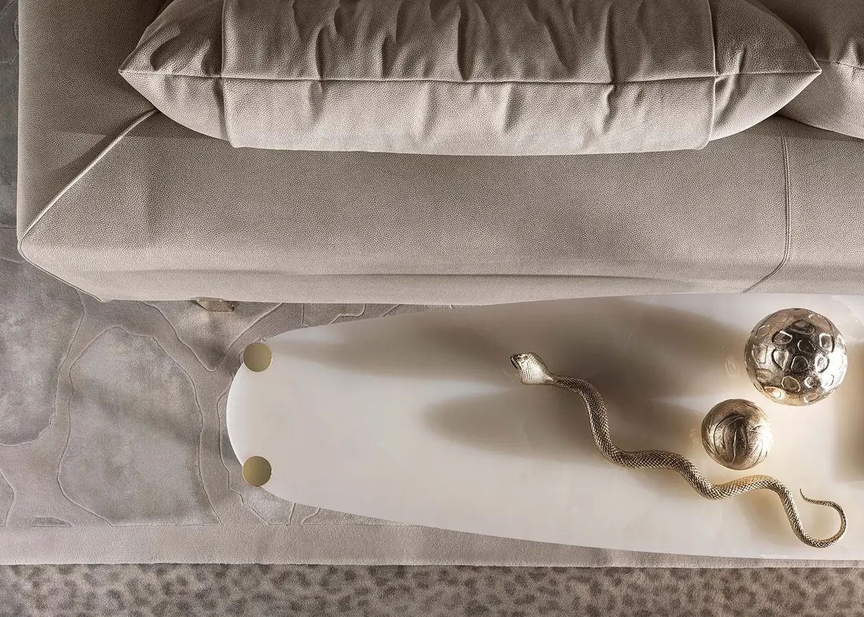 14486-RCHI_Catalogue_roberto-cavalli-luxury-sofa-detail-white-stone-table-ajwaad-palace